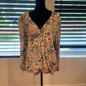 New with tags—Women’s long sleeve v-neck blouse